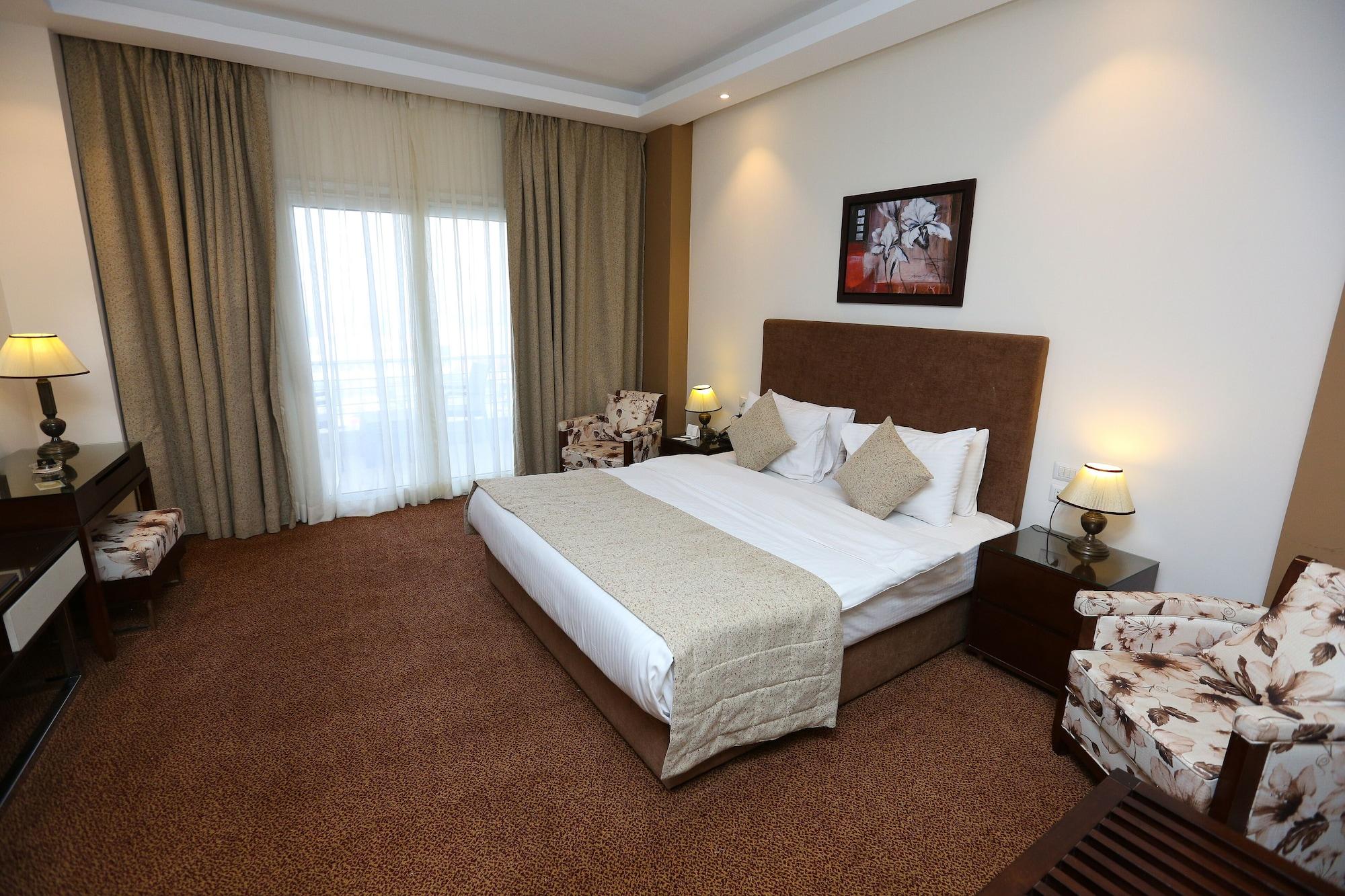 Tolip El Narges Otel Kahire Dış mekan fotoğraf A bedroom at the hotel